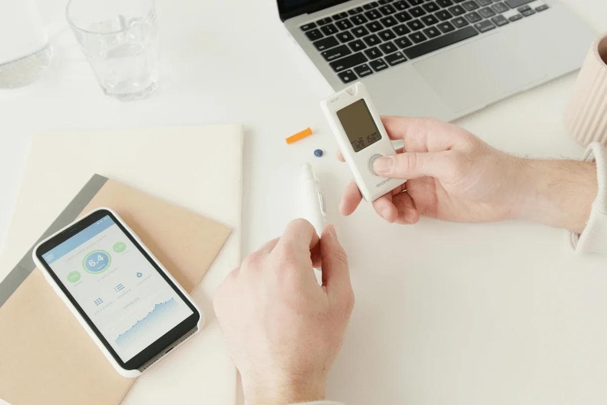 Blood sugar monitor connected with mobile health app.